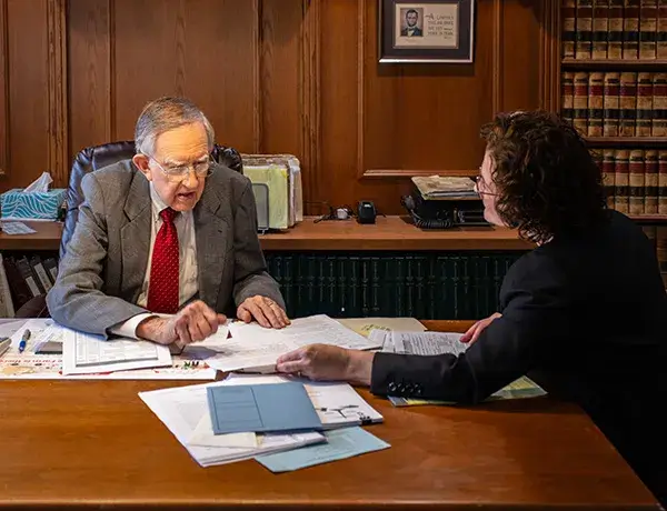 Posey and Perkins discussing case